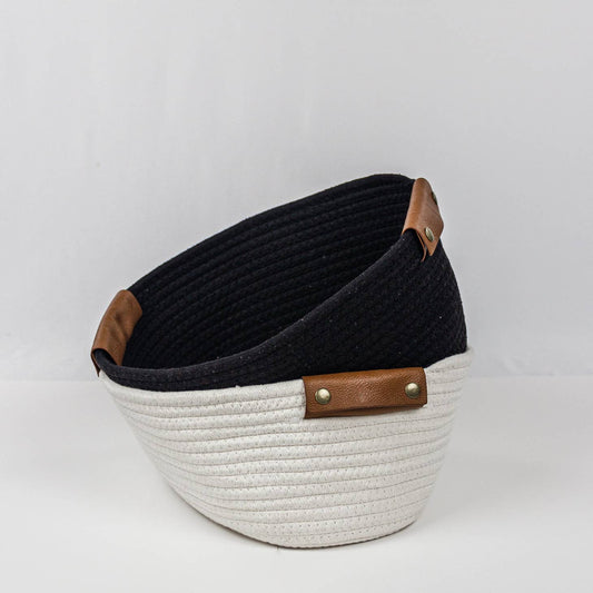 Woven storage basket with leather handles